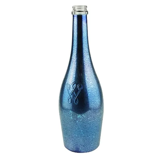 Sparkling wine bottle in champagne green glass showing heavy base and pressure-rated construction