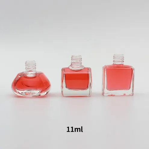Assorted small glass jars in 1oz 2oz and 4oz sizes with metal screw lids arranged for wholesale display