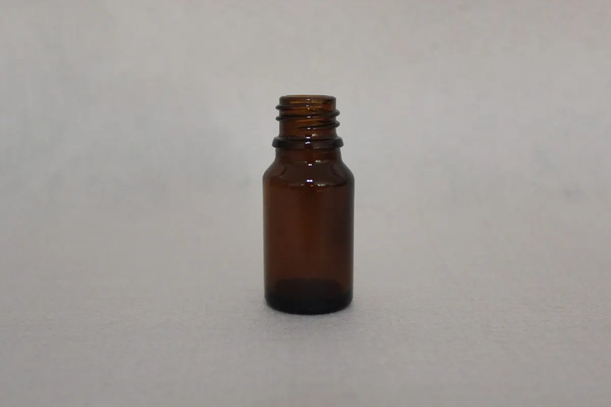 case-packed amber tincture bottles ready for a supplement brand filling line