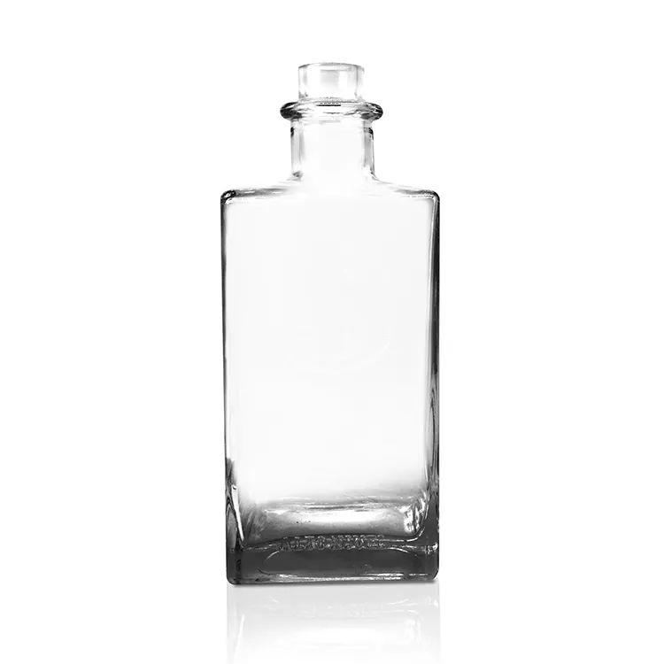 Custom square liquor glass bottle developed from proprietary mold
