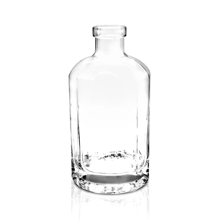 Botella de vidrio para leche y bebidas lácteas con etiqueta para distintos mercados