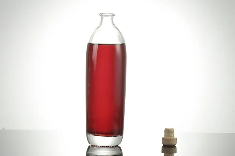 750 ml liquor bottle with matched closures ready for filling lines