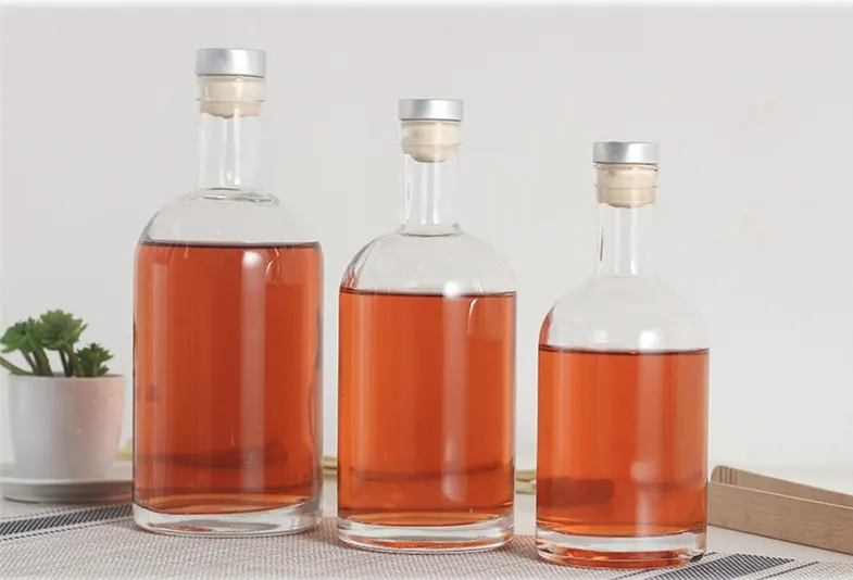 Premium spirits glass bottle shapes including nordic round flask and square gin bottle