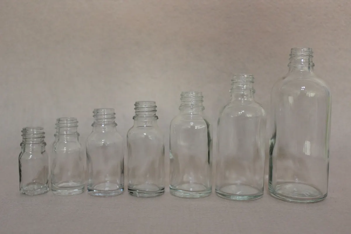 boston round glass bottle with cap - product range available for bulk orders
