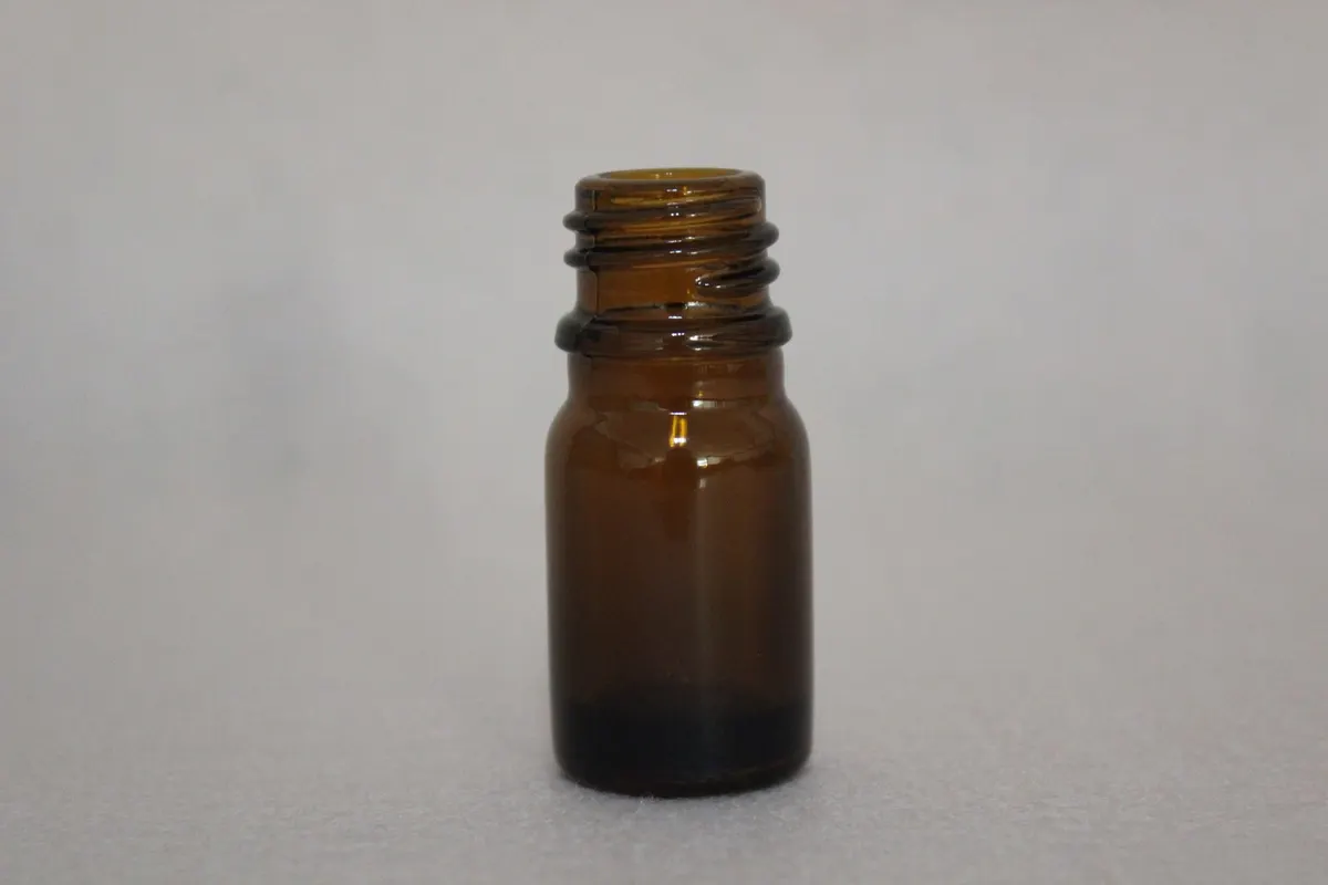 dropper bottles with matched closures ready for filling lines