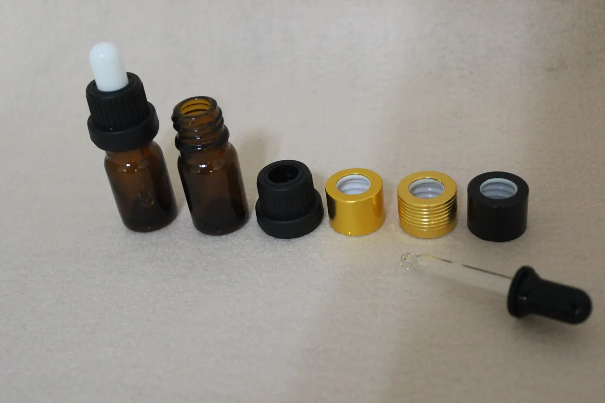 essential oil bottles with matched closures ready for filling lines