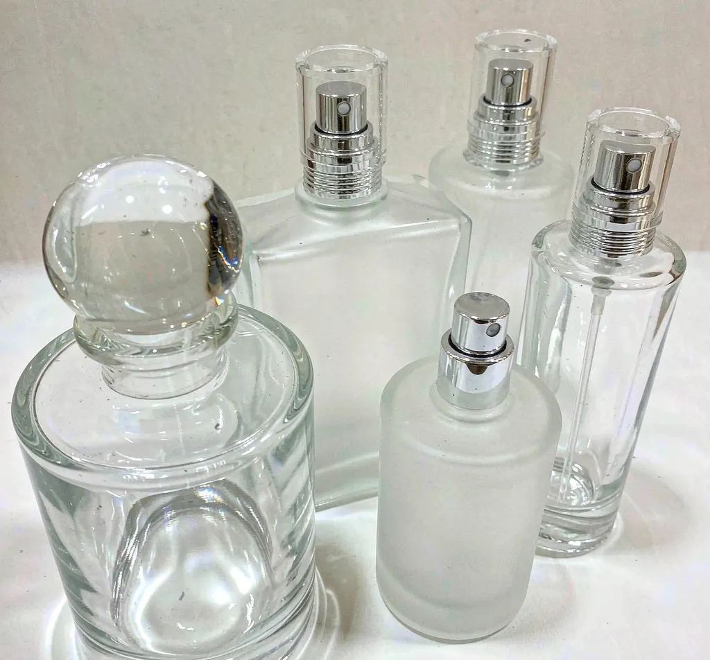 Clear and frosted glass perfume atomizer bottles with silver fine-mist sprayers