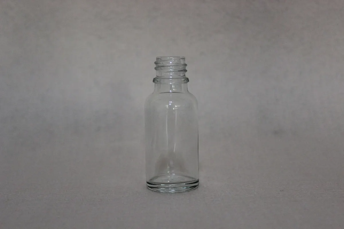 glass bottle sterilizer tunnel with matched closures ready for filling lines