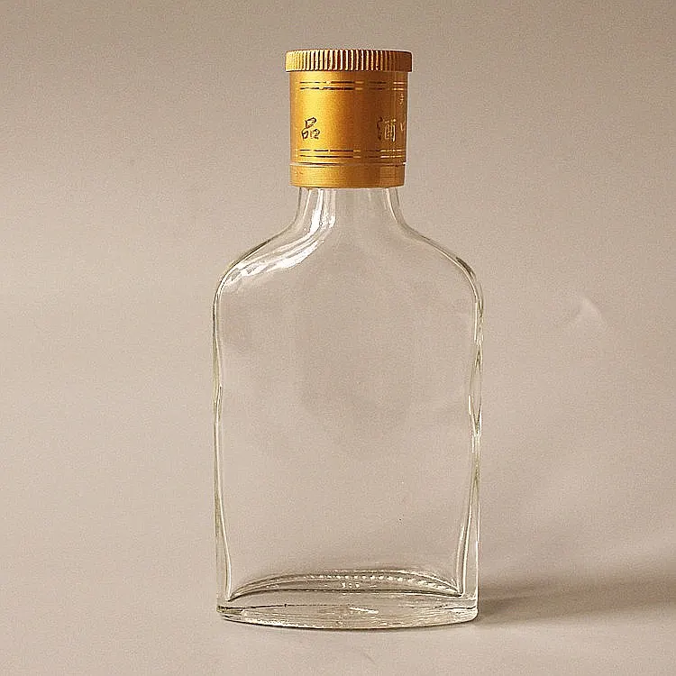 1.75L glass handle vodka bottle with integral molded finger grip