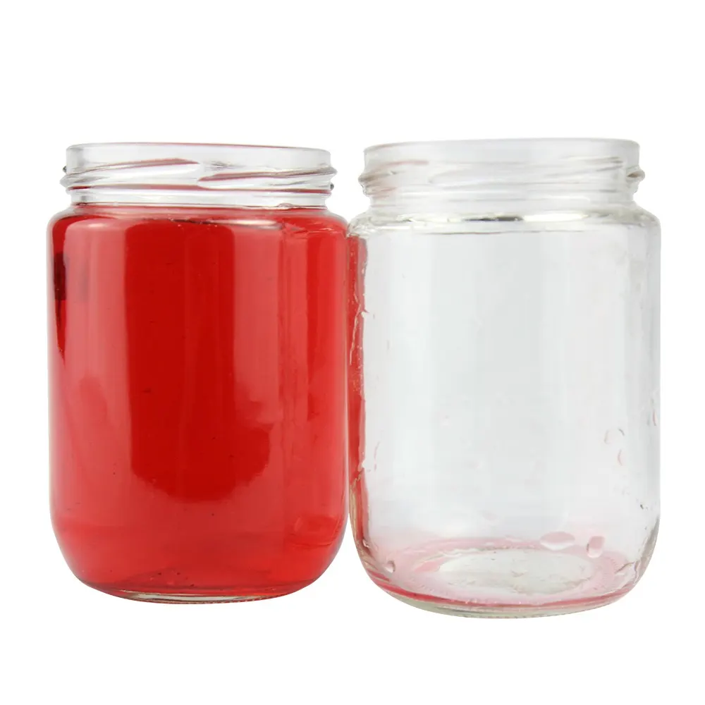 Tinplate lug twist off caps on glass food jars with safety button