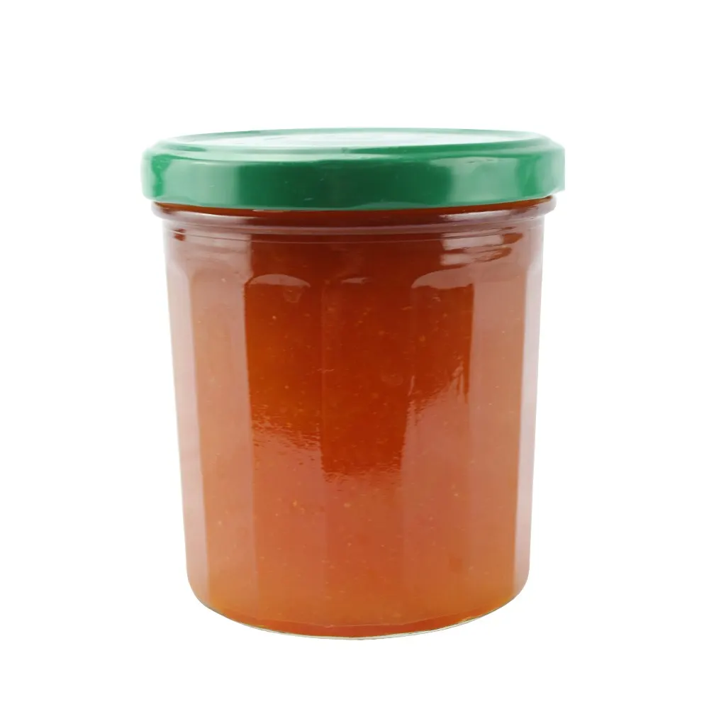 Glass storage jars with bamboo lids and silicone sealing rings on pantry shelf
