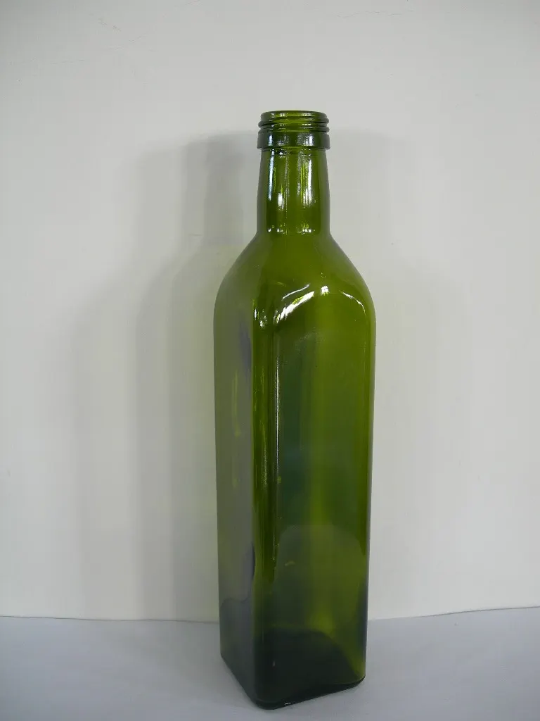 Glass oil bottles from the factory production line