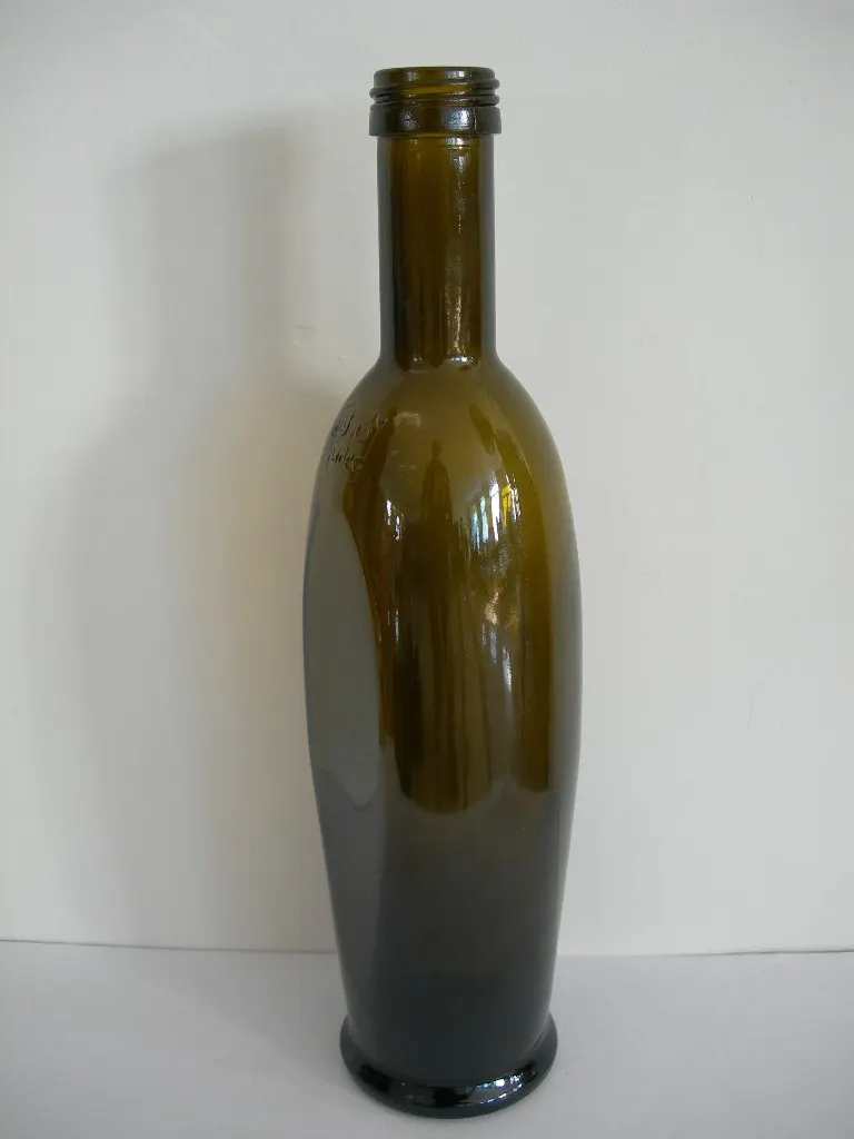 Glass oil bottles from the factory production line