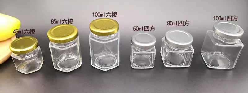 Ligne de bouteilles de sauce en verre TO-63 montrant la régularité du col et du bouchage