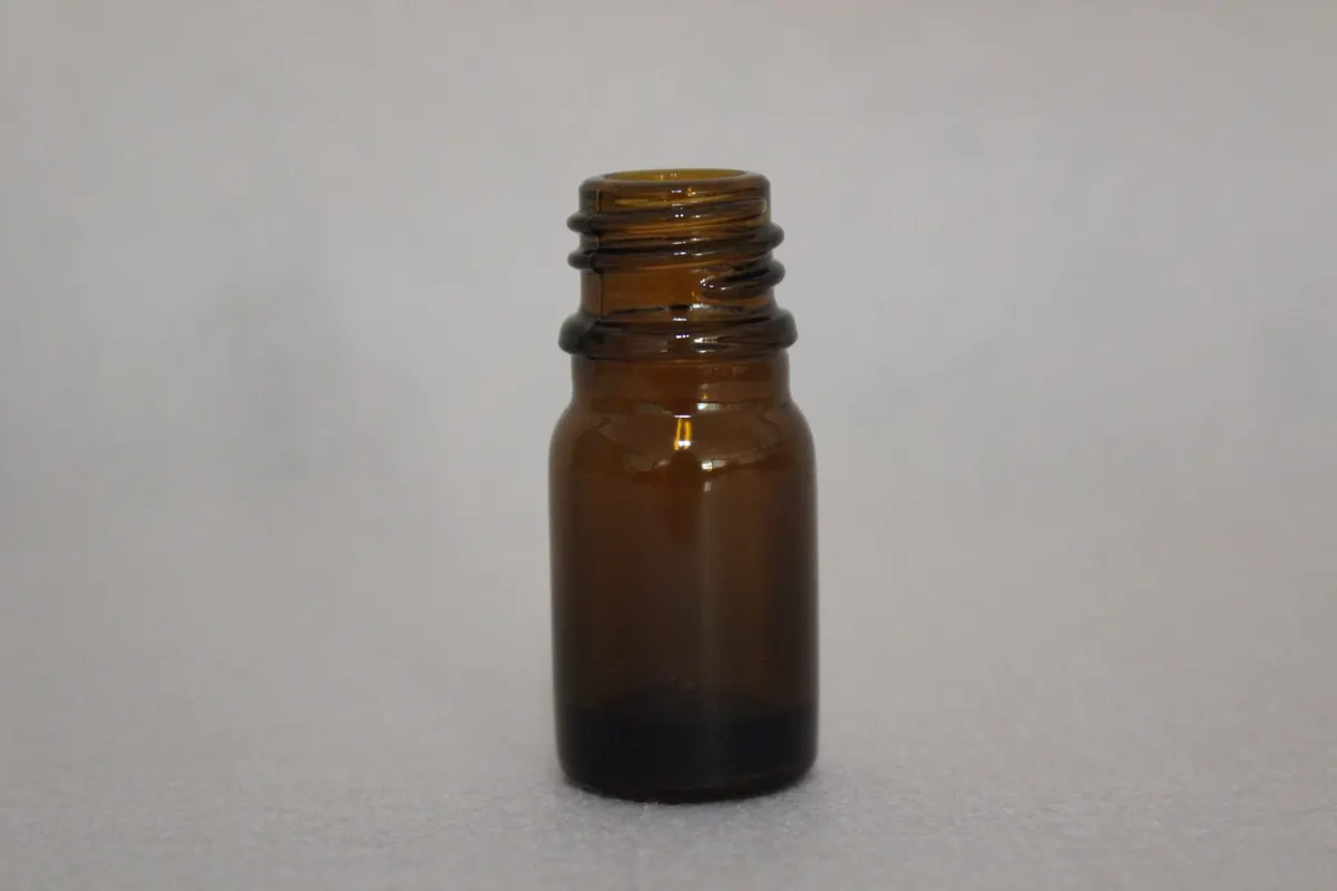 Glass bottles for mouthwash with pump and cork closures