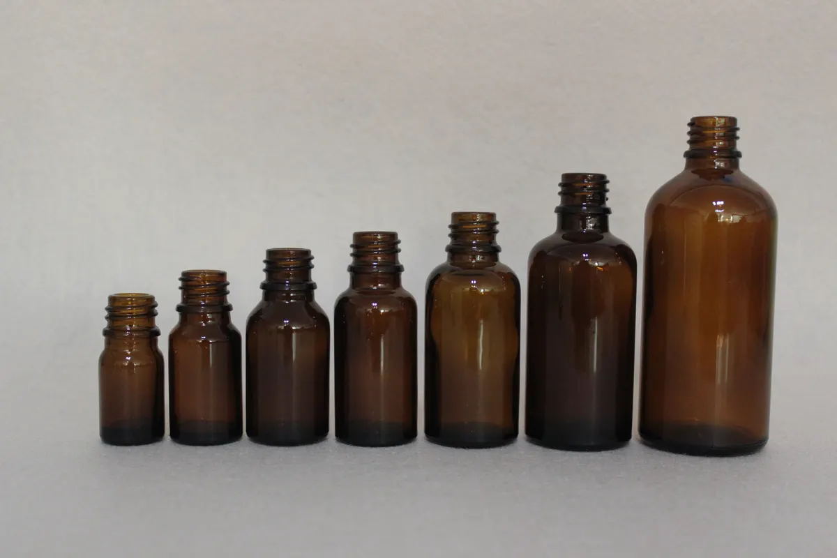 cartons of private label glass bottles marked with distributor brand codes for blind shipping