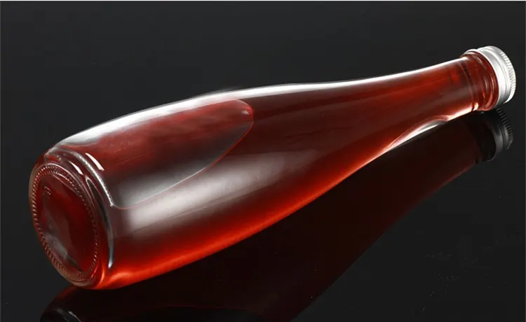 Whiskey bottle size lineup from 50ml miniature to 1.75L handle